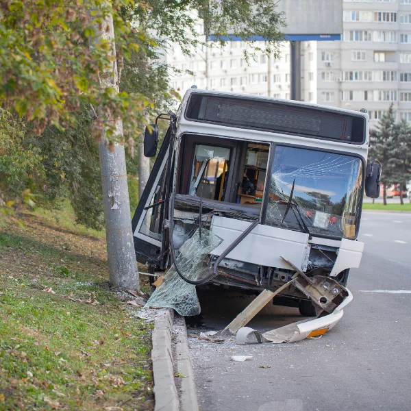 An image showing a public transit bus involved in an accident.